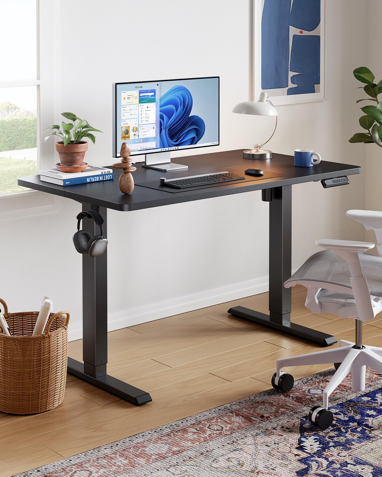 HUANUO 48" x 24" Electric Standing Desk Adjustable Height, 4 Memory Height Settings, Headphone Hook, Cable Manager, Sit Stand Up Desk for Home Office & Computer Workstation, Black